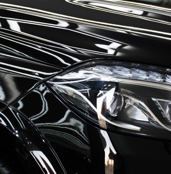 Shiny surface of black car with ceramic coating