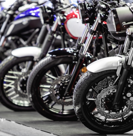 Motorcycles lined up in showroom