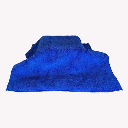 Blue microfibre drying towel against white background.