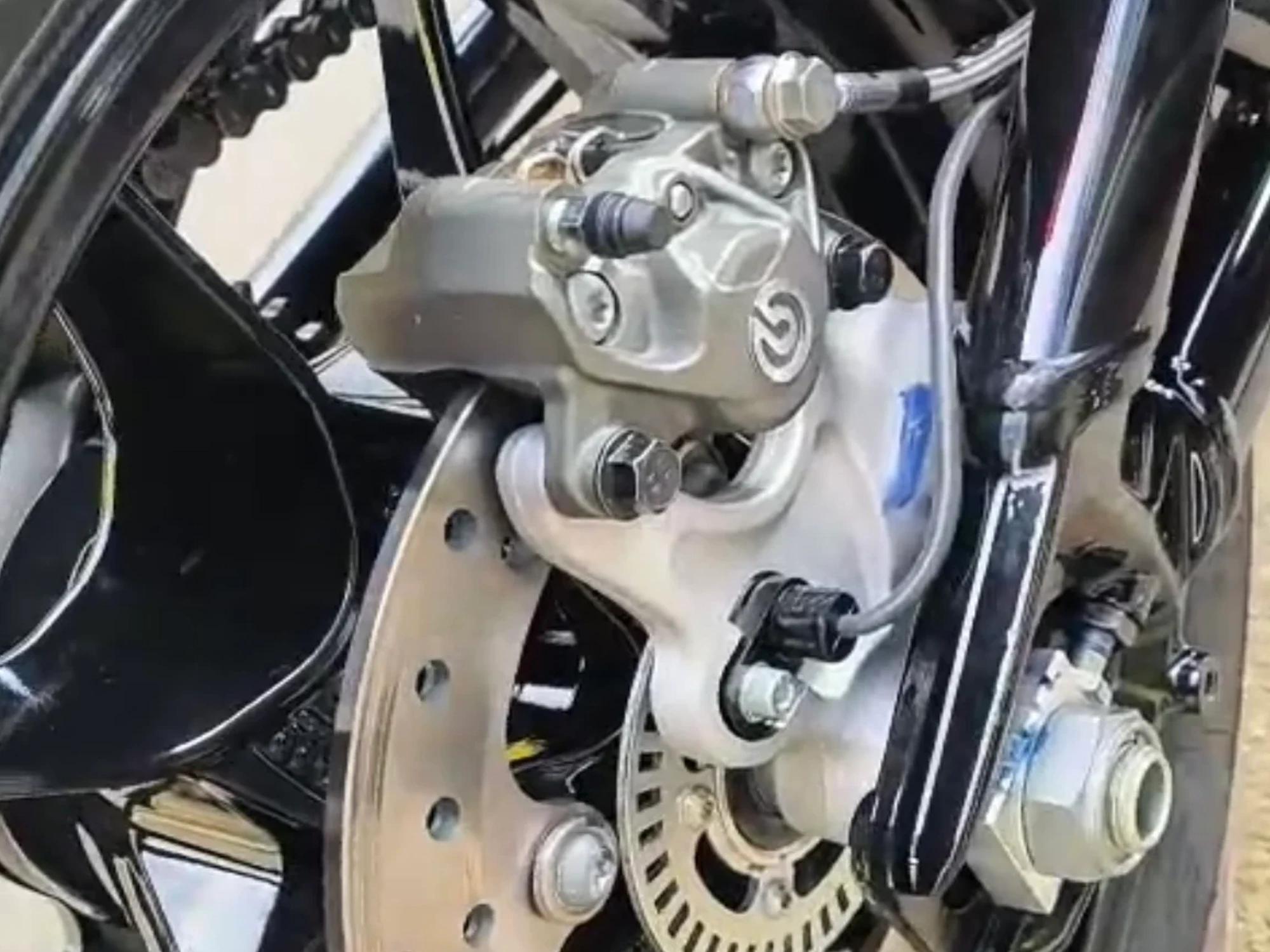 Close up of motorbike gears.