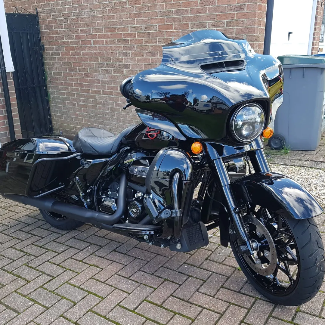 Customer motorbike on driveway